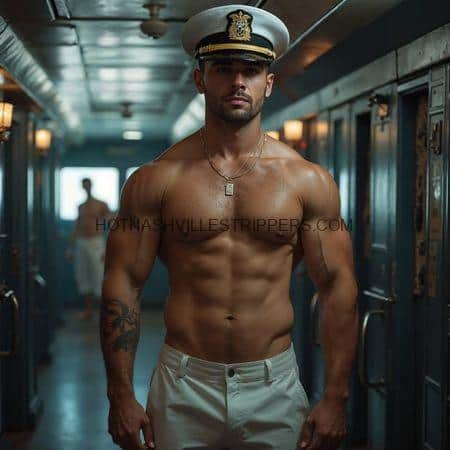 A shirtless man in a sailor hat standing in a hallway